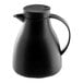 A black plastic coffee carafe with a handle and a glass liner.