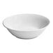 A large, round, warm white porcelain bowl with a smooth finish.