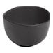 An Ariane charcoal grey porcelain bowl with black dots and a curved edge.
