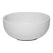 A white embossed porcelain bowl with a smooth, rounded shape.