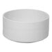 A white embossed porcelain soup bowl with a simple, round design.