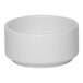 A small, round, white porcelain butter ramekin.