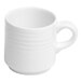 A small white stackable porcelain espresso cup with an embossed design and a handle.