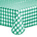 A green and white gingham vinyl table cover with a flannel back.