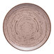 An Ariane round rimless porcelain plate with a brown and white spiral pattern.