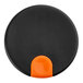 A black plastic lid with an orange thumb press designed for a 50 oz. coffee carafe.