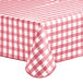 A rectangular burgundy and white gingham vinyl table cover with a flannel back.