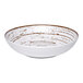 An Ariane Tornado white porcelain plate with brown specks.