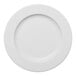 A round, warm white porcelain plate with a wide rim.