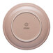 An Ariane Tornado round rimless porcelain plate with a sage rim.