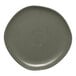 An Ariane mist green porcelain plate with grey dots.