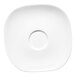 A white porcelain saucer with a circular center.