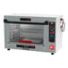 A silver Metro HotBlox countertop heated holding cabinet with a red handle on the door.