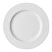 A white round porcelain plate with an embossed wide rim.