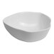 An Ariane warm white porcelain bowl with a curved edge.