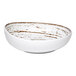 An Ariane white porcelain slanted coupe bowl with brown specks.