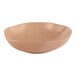 An Ariane dark sand porcelain bowl with speckles on it.