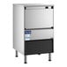 An undercounter air-cooled ice machine with a stainless steel exterior and a built-in storage bin.