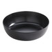 A large black round melamine serving bowl.