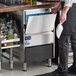 An undercounter air-cooled half cube ice machine with a 44 lb. bin, designed for commercial use.