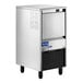 An undercounter air-cooled ice machine with a stainless steel exterior and a front-facing bin.