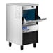 An undercounter air-cooled gourmet cube ice machine with a stainless steel exterior and a front-opening bin.
