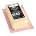 A block of Castello Creamy Havarti cheese in an 8 oz vacuum-sealed package.