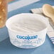 A container of Cocojune organic cultured coconut dairy-free yogurt alternative.