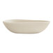 A ivory melamine bowl with a curved bottom.