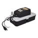 A black and white Liberty Pumps automatic condensate pump with a safety switch.
