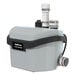 A white and black Liberty Pumps 406 compact drain pump with pipes attached.