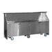 A stainless steel portable back bar with black laminate accents, two locking storage compartments, and caster wheels.