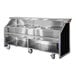 A stainless steel and black laminate electric portable bar with a fixed speed rail, two 40 lb. ice bins, and caster wheels.