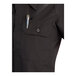 A black short sleeve women's work shirt with a buttoned chest pocket holding a pen.