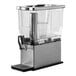 A rectangular 3-gallon cold beverage dispenser with a brushed stainless steel base, clear plastic container, hands-free spigot, and infuser and ice tubes.