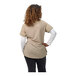 A women's khaki short sleeve work shirt shown from the back, layered over a long sleeve white shirt.