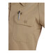 A khaki short sleeve work shirt with a buttoned chest pocket and a pen clipped to the pocket.