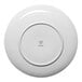 A round, white porcelain plate shown from the bottom with the Ariane brand logo at the center.