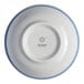 A round blue and white two-tone porcelain bowl shown upside down with the Ariane brand logo on the bottom.