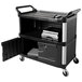 A black Rubbermaid equipment cart with a door open.