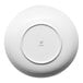 A white porcelain plate shown from the bottom with the Ariane brand logo at the center.