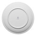 A round, warm white porcelain rimless coupe plate viewed from the bottom with the Ariane logo at the center.