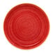A red round rimless coupe porcelain plate.