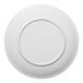 A round, warm white porcelain rimless coupe plate.