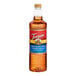 A 1-liter plastic bottle of Torani Chocolate Chip Cookie Dough flavoring syrup.