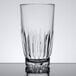 A clear 12 oz. beverage glass with a faceted design.