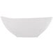 A white satin matte porcelain bowl with an organic, slightly curved shape.