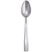 A stainless steel teaspoon with a textured handle.