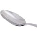 A stainless steel teaspoon with a polished finish.
