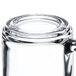 A clear glass 10 oz. warm beverage mug shown upside down.